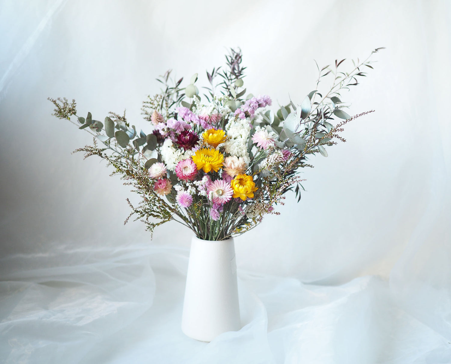 ELLIE – colourful dried flowers in a tall white ceramic vase