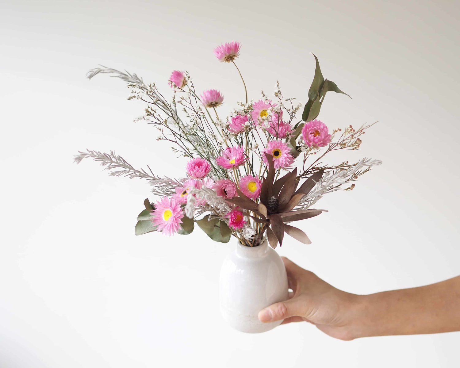 ELISE – dried paper daisies and native grass in a white speckled vase 12