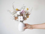 HERA – dried flowers in a white speckled vase 1