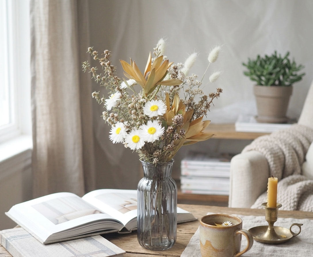 LULU - dried yellow strawflowers in a yellow vase