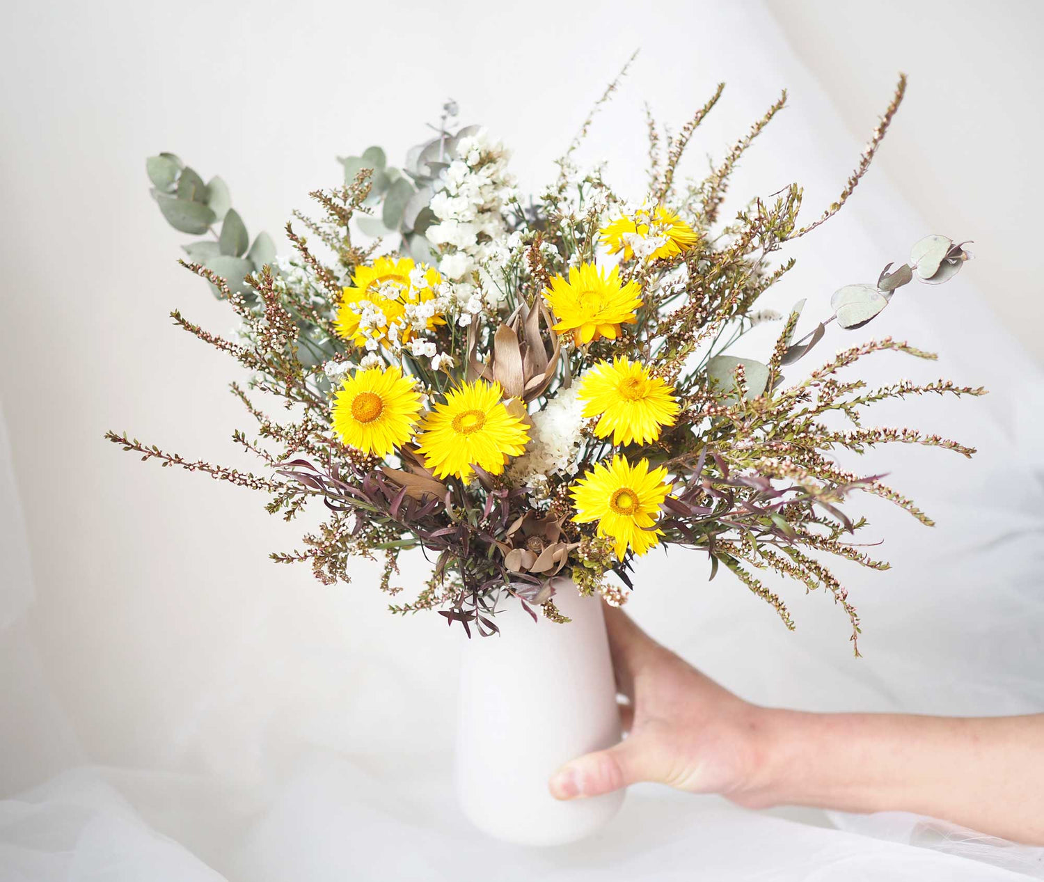 ISA – Yellow White dried flowers in a tall white ceramic vase