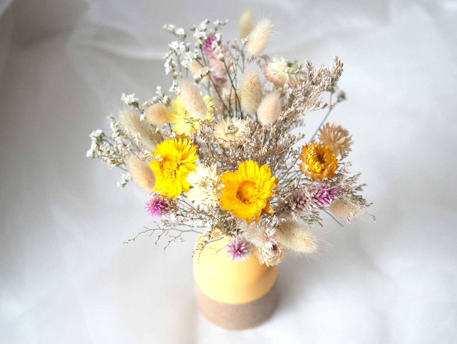 LULU - dried yellow strawflowers in a yellow vase