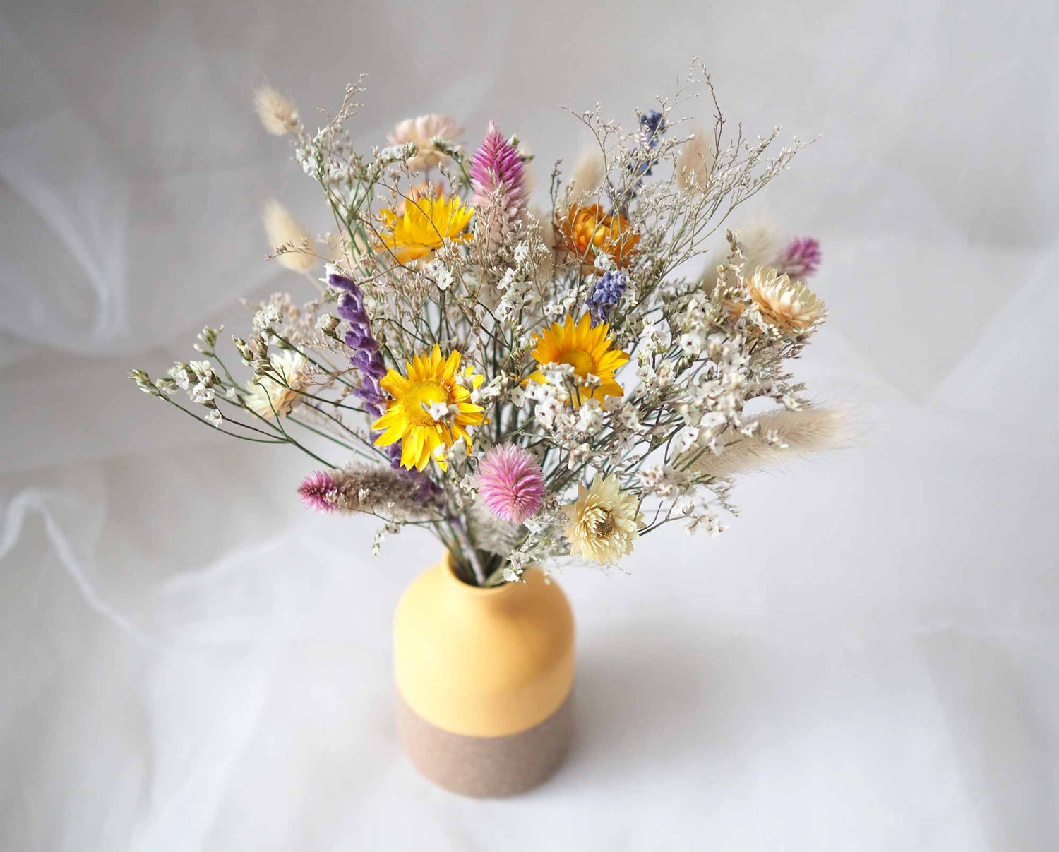 LULU - dried yellow strawflowers in a yellow vase