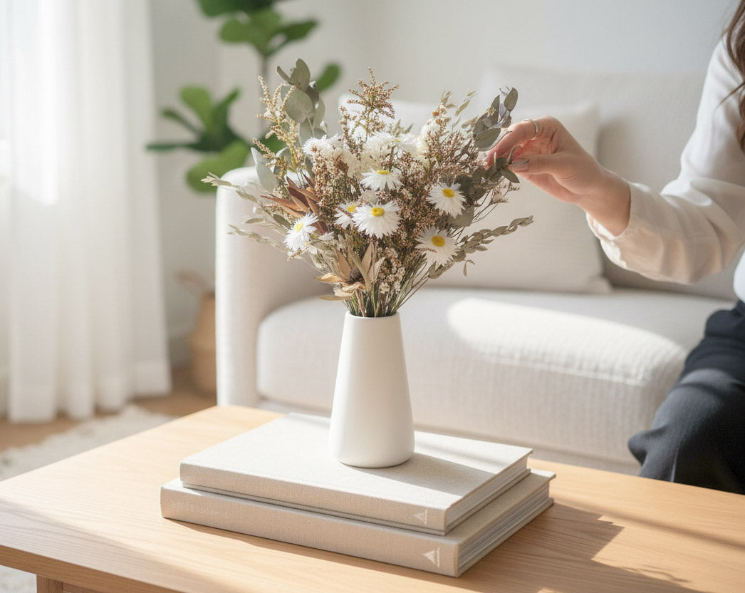 KIRA – native Australian flowers in a tall white ceramic vase