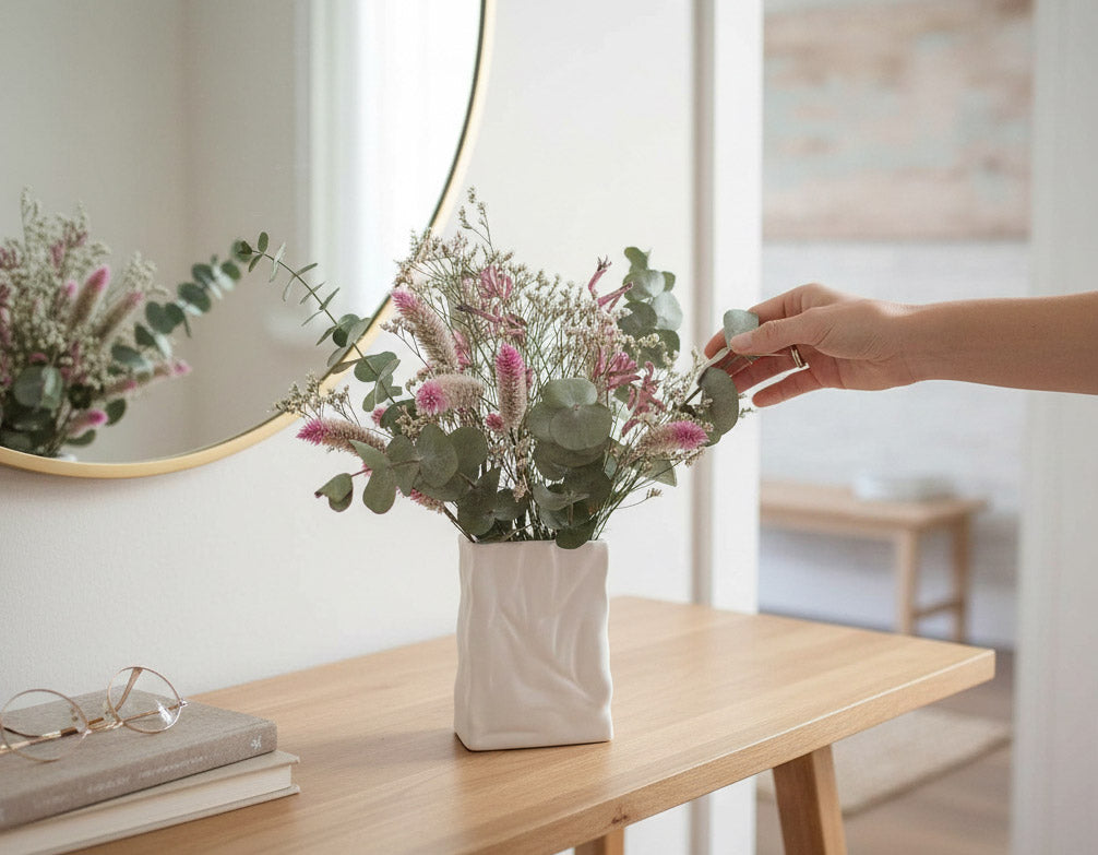 SYLVIE – purple, pink, white and green dried flowers in a white ceramic bag vase